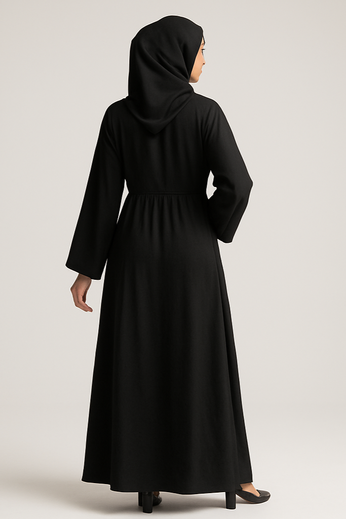 Professional studio photo of woman in abaya - back view