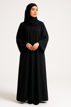 Professional studio photo of woman in abaya